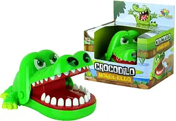 Crocodilo morde dedo
